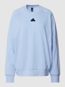 ADIDAS SPORTSWEAR Sweatshirt mit Label-Detail in Hellblau, Größe XS