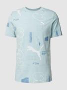 PUMA PERFORMANCE T-Shirt mit Allover-Label-Muster in Hellblau, Größe S
