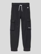 CHAMPION Regular Fit Sweatpants mit Cargotaschen in Black, Größe 104