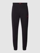 HUGO Sweatpants in unifarbenem Design mit elastischem Bund in Black, G...