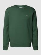Lacoste Sweatshirt mit Rundhalsausschnitt Modell 'TAPE CREW' in Gruen,...