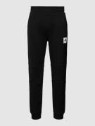 The North Face Regular Fit Sweatpants mit Label-Print in Black, Größe ...