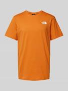 The North Face T-Shirt mit Label-Print Modell 'REDBOX' in Orange, Größ...