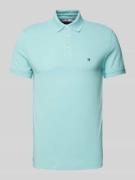 Tommy Hilfiger Slim Fit Poloshirt mit Label-Stitching in Helltuerkis, ...