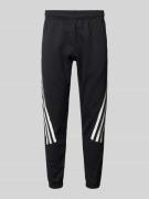 ADIDAS SPORTSWEAR Regular Fit Sweatpants mit labeltypischen Streifen i...