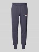 PUMA PERFORMANCE Regular Fit Sweatpants mit Label-Print in Anthrazit, ...