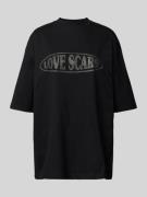 LOVE SCARS Oversized T-Shirt mit Label-Print in Black, Größe M