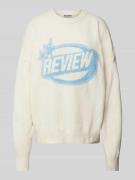 Review Oversized Strickpullover mit Label-Detail in Offwhite Melange, ...