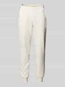 PUMA PERFORMANCE Relaxed Fit Sweatpants mit Label-Print in Offwhite, G...