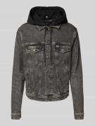 Tommy Jeans Regular Fit Jeansjacke mit Label-Stitching Modell 'RYAN' i...