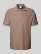 PUMA PERFORMANCE Relaxed Fit Poloshirt mit Label-Stitching in Taupe, G...