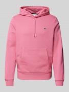 Lacoste Regular Fit Hoodie mit Baumwolle in Pink, Größe L