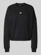 ADIDAS SPORTSWEAR Oversized Sweatshirt mit Label-Stitching in Black, G...