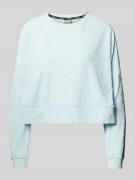 PUMA PERFORMANCE Cropped Sweatshirt mit Strukturmuster in Tuerkis, Grö...