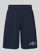 CHAMPION Baggy Fit Sweatshorts mit Label-Stitching in Dunkelblau, Größ...