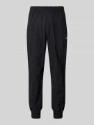 BLKVIS Relaxed Fit Trackpants mit Label-Stitching in Black, Größe L
