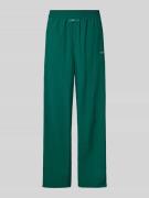 Karo Kauer Trackpants mit Label-Patch und -Print in Dunkelgruen, Größe...