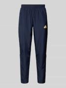 adidas Sportswear Sweatpants mit Label-Print in Dunkelblau, Größe S