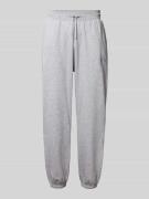 The North Face Regular Fit Sweatpants mit Label-Stitching in Hellgruen...