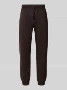 MCNEAL Regular Fit Sweatpants mit elastischen Beinabschlüssen in Schok...