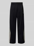 CK Calvin Klein Flared Sweatpants mit Label-Stitching in Black, Größe ...