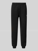 Lacoste Tapered Sweatpants aus reiner Baumwolle in Black, Größe XL