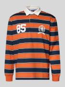Tommy Jeans Relaxed Fit Poloshirt aus reiner Baumwolle in Orange, Größ...