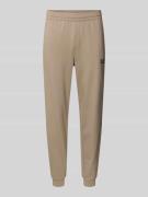 EA7 Emporio Armani Sweatpants mit Logo und elastischem Bund in Beige, ...