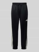 adidas Sportswear Sweatpants mit elastischem Bund in Black, Größe L