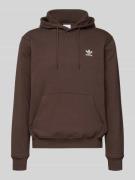 adidas Originals Hoodie mit Kapuze in Dunkelbraun, Größe M