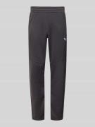 PUMA PERFORMANCE Sweatpants mit elastischem Bund in Black, Größe L