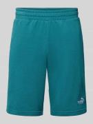 PUMA PERFORMANCE Shorts mit Label-Stitching in Bottle, Größe L