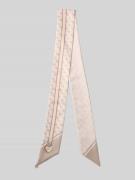 Guess Bandeaux mit Logo-Charm in Beige, Größe 1