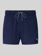 PUMA Badehose mit Seitentaschen und Klettverschlusstasche hinten in Ma...