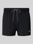 PUMA Badehose mit Seitentaschen und Klettverschlusstasche hinten in Bl...