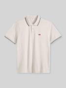 Levi's® Regular Fit Poloshirt mit Kontraststreifen in Beige, Größe L
