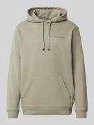 Tommy Jeans Relaxed Fit Hoodie aus reiner Baumwolle in Oliv, Größe M