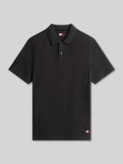 Tommy Jeans Regular Fit Poloshirt aus reiner Baumwolle in Black, Größe...