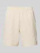 PUMA PERFORMANCE Shorts mit Logo-Stitching in Offwhite, Größe L