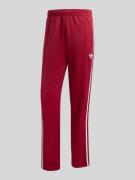 adidas Originals Regular Fit Trainingshose mit Baumwoll-Anteil in Bord...