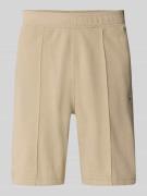 CHAMPION Bermudas mit elastischem Bund und Label-Stitching in Beige, G...