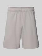 CHAMPION Shorts mit elastischem Bund und Label-Stitching in Beige, Grö...