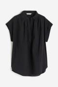 H&M Baumwollbluse mit V-Ausschnitt Schwarz, Blusen in Größe XS. Farbe:...