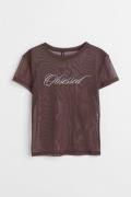 H&M T-Shirt mit Print Dunkelbraun/Obsessed in Größe XS. Farbe: Dark br...