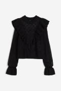 H&M Pointellestrick-Pullover mit Volants Schwarz in Größe XXS. Farbe: ...