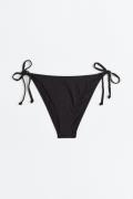 H&M Tie-Tanga Bikinihose Schwarz, Bikini-Unterteil in Größe 50. Farbe:...