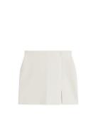 Arket Jersey-Minirock Cremeweiß, Röcke in Größe L. Farbe: Off white