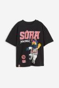 H&M T-Shirt mit Print Schwarz/LEGO NINJAGO, T-Shirts & Tops in Größe 9...