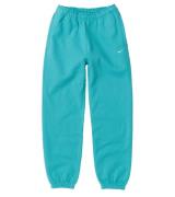 NIKE Solo Swoosh Pant CW5565-393 Damen Jogging-Hose mit Reißverschluss...